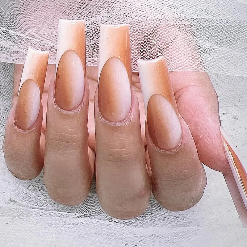 Peach-caramel ombré square nails with crisp white French tips